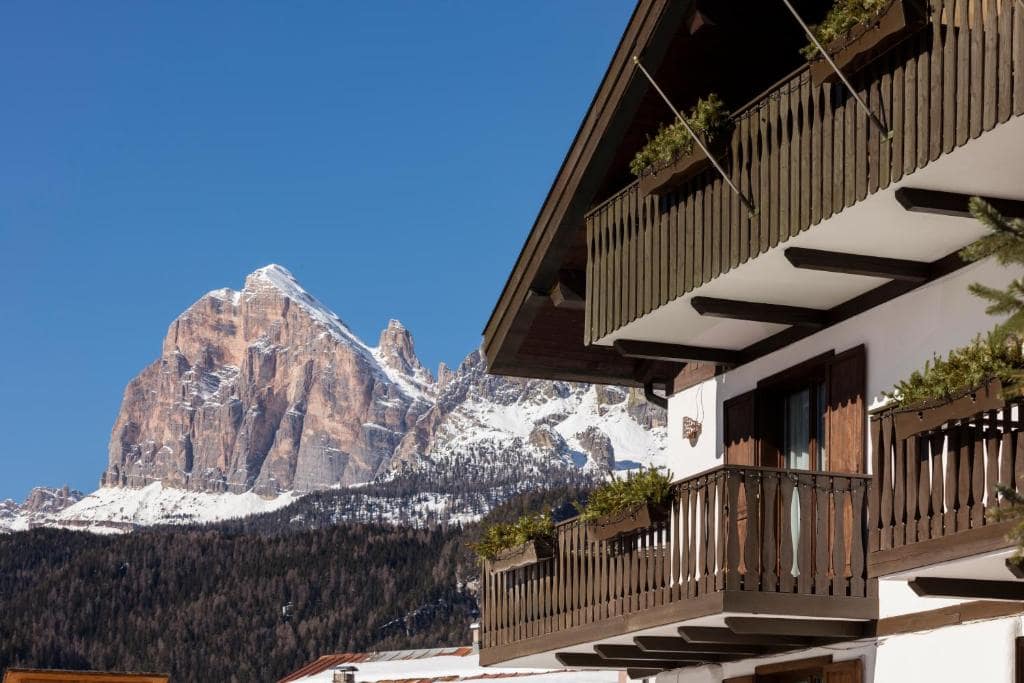 luxury spa resort in Dolomites with mountain backdrop